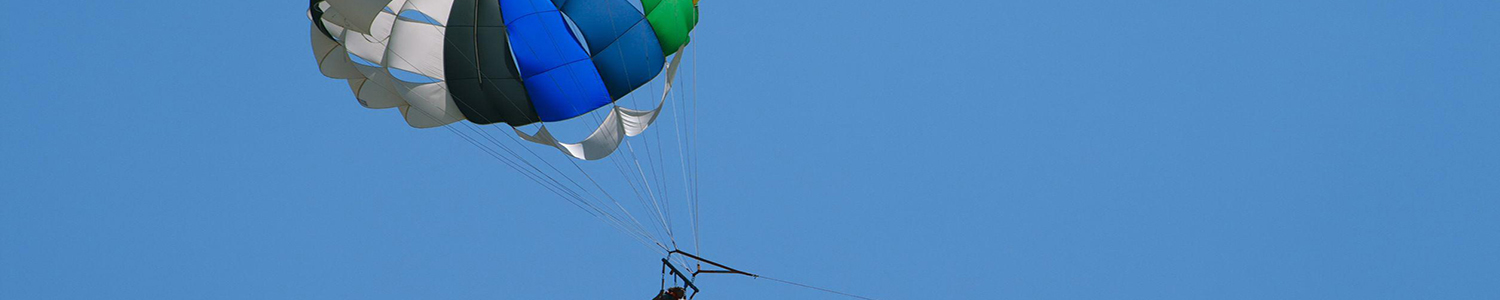 Photo of person parasailing.