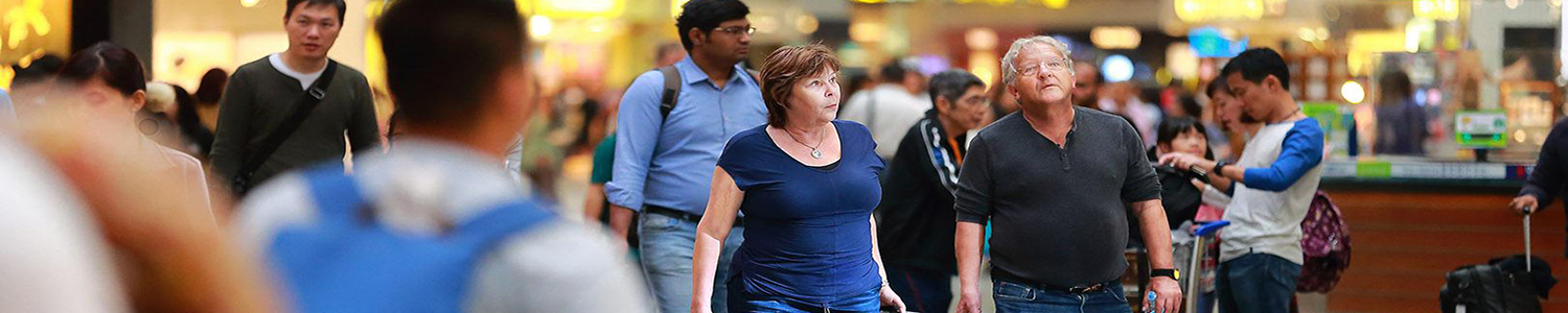 Photo of travellers in the transit area of Changi Airport